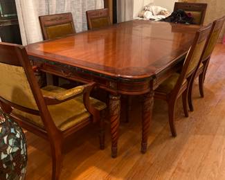 Lovely Empire style dining table with six chairs by Henredon