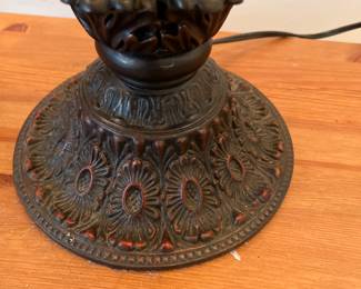 Base of bulb shaped leaded glass table lamp with rainbow of colors