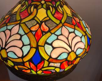 Shade of bulb shaped table top lamp