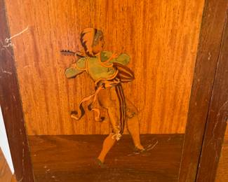 inlaid wood musician