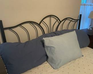 . . . wrought-iron headboard