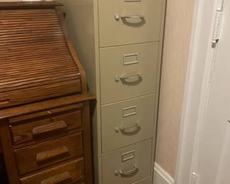 . . . four-drawer file cabinet 