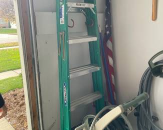 . . . Werner fiberglass ladder and hose caddy