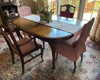 . . . antique solid walnut able and chairs with Queen Ann legs