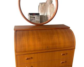 $1300 USD      Roll Top Mid Century Scandinavian Desk w Vildbjerg Møbelfabrik Round Mirror JW169-7     Mid 20th Century Mid Century Modern Rolltop Desk Egon Ostergaard Style.  Mid Century Modern Blonde Wood Rolltop Desk. This rolltop desk comes with lots of storage space, 3 large drawers & 3 small drawers.  A beautiful small roll top desk in teak. The desk has a teak veneer finish and was made in the 1970s. It has lots of storage and the work surface pulls out once the roll top is up. Includes the stunning Vildbjerg Møbelfabrik Round Mirror.

NO KEY

Dimensions: 36 x 18 x 38"H

Local pick up Gaithersburg, MD.  Contact us for shipper suggestions.     https://goodbyhello.com/products/roll-top-mid-century-scandinavian-desk-w-vildbjerg-mobelfabrik-round-mirror-jw169-7?_pos=11&_sid=aa925a30b&_ss=r