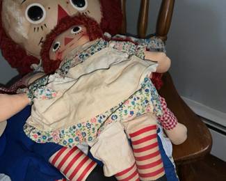 Ragged Raggedy Ann + Andy, chilling on the chair