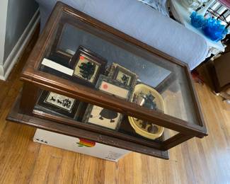 Display case with silhouettes 