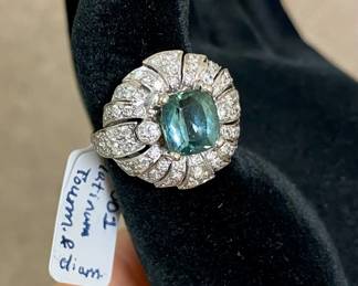 Indicolite tourmaline with diamonds set in platinum. Comes with jewelers insurance appraisal report. 