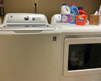 hand towels, GE washer & dryer, laundry room wall art, iron, detergent, ironing board