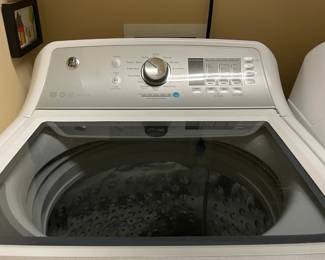 hand towels, GE washer & dryer, laundry room wall art, iron, detergent, ironing board