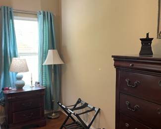 bedroom set, turquoise table lamp, luggage rack, floor lamp, wire storage basket
