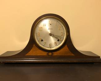 antique clock with brass fixtures