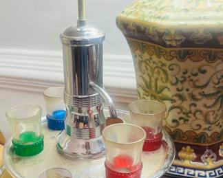 MCM chrome and glass carousel decanter set