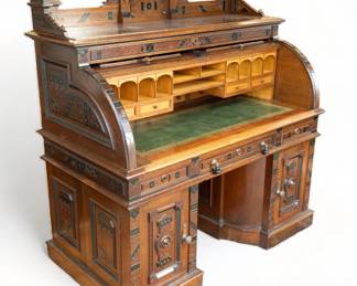 Wooton Desk Manufacturing Company (American, 1874-1890) Renaissance Revival Extra Grade Rotary Desk, Ca. 1876, H 63.5" W 56" Depth 30"