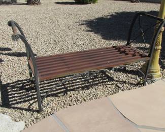 Heavy metal bench.  We have brand new cushions for it too!