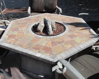 Propane fire pit w/four chairs.