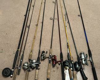 Over 25 fishing poles. Including fly 