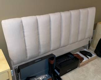 white upholstered King headboard