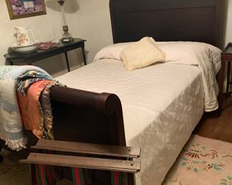 Sleigh bed, vintage suitcase valets, pitcher and wash basin 