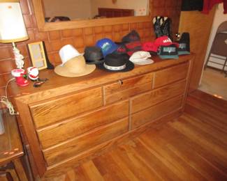 Dresser, mirror and trucker hats