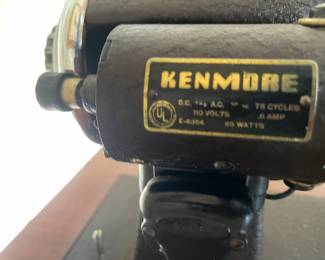 Vintage Kenmore sewing machine in cabinet