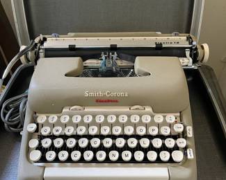 Vintage Smith-Corona electric typewriter in carry case - working