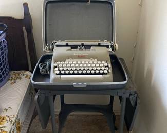 Vintage Smith Corona electric typewriter in carry case (working), typing table