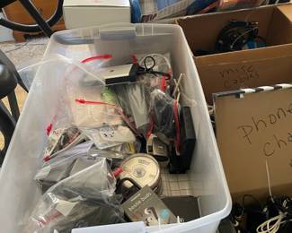 Many computer hard drives, components, cables, chargers and associated computer-related pieces