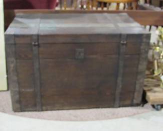 one of several old trunks. this one has blacksmith handle and square nails.