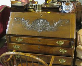 This is a drop front Desk made in Ireland heavily carved. 