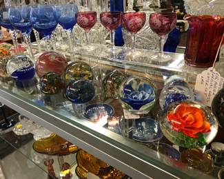 BEautiful paperweights, ruby red cordials, cobalt wine glasses