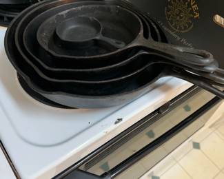 VINTAGE CAST IRON PANS.