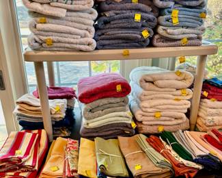 Decorative pillows, bedspreads, comforters.