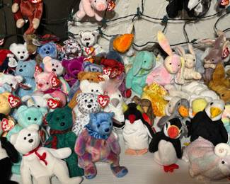 A sale would not be complete without Beanies!! More in a basket under the table. All new with tags - some rare ones.