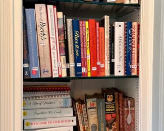 Cookbooks! Great hardbound books. The bottom shelf is full of "Church Cookbooks" - tried and true recipes.