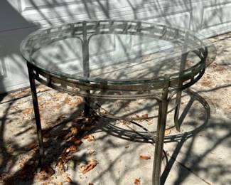 Glass-topped patio table