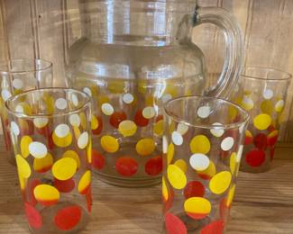 Vintage polka dot pitcher with four glasses