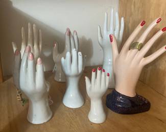 Collection of hands - some are vases