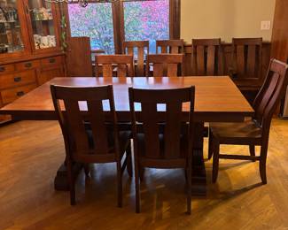 Furniture House expandable dining table with (2) leaves and (10) chairs. Table measures 72"x42"x30.5", each leaf is 18"x42"