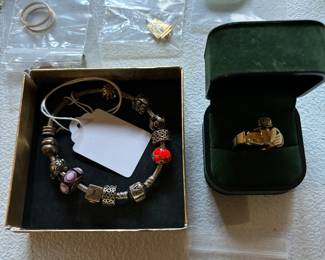 14kt gold ring and Pandora bracelet with charms