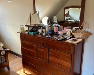Thomasville dresser measures 56"x17.5"x42" and the mirror is 48"x39"