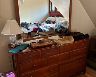 Thomasville dresser measures 64"x17.5"x35.5" and the mirror is 48"x39"