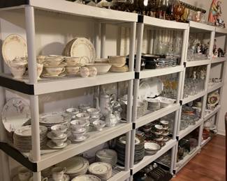 Glassware, China, place settings (utensils), figurines.