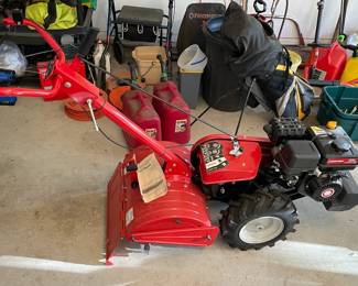 Troy built Mustang Tiller with reversible blades. Like new!               $900.00