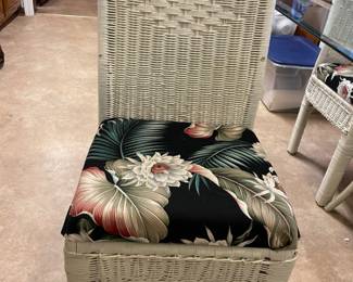 White wicker glass top table and 4 chairs. Table 72”w 42”d 29” t chairs 17”w 16”d 36”t  19”fl to seat.  $285.00