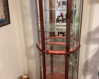 Curio Bow Front w light. 5 glass shelves    29” w 17” d 76.5”t
$250
