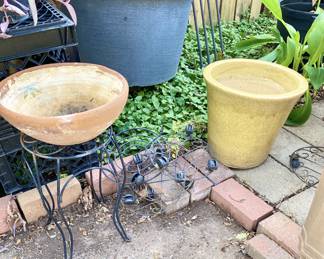 Plant coasters, plant stand and pots.