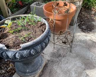 Various pots and plant shelf.