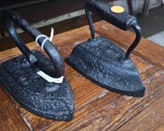 TWO CAST IRON SMOOTHING IRONS
