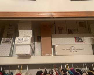 New collectible dolls, stands and cases also for sale